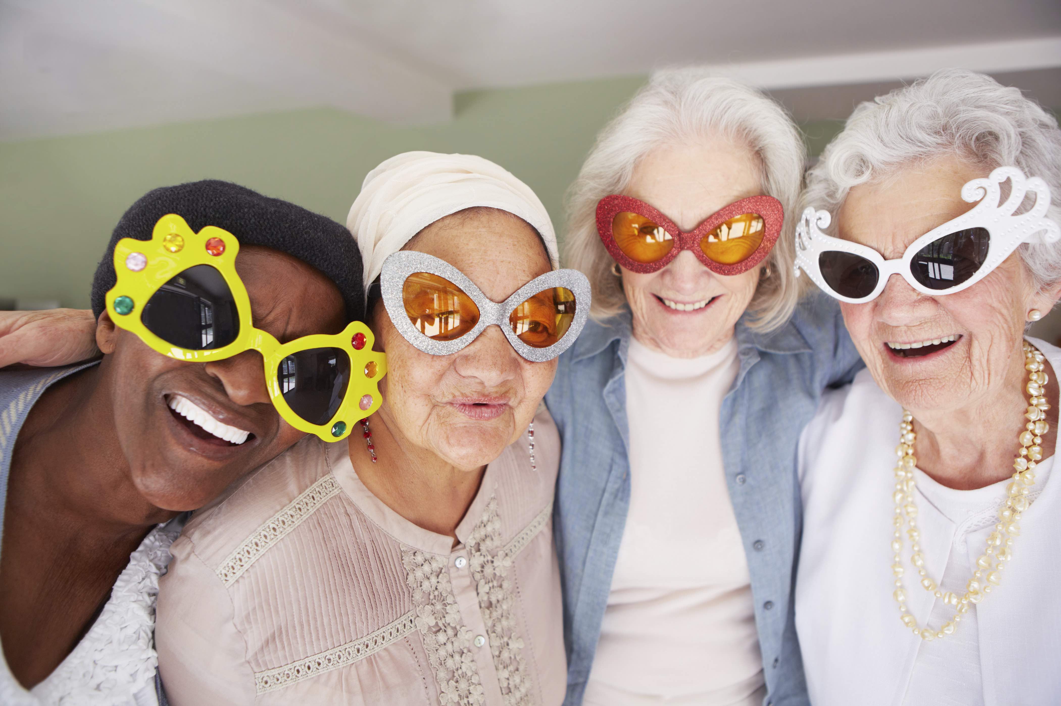 grou-of-smling-senior-women-wearing-sunglasses.jpg
