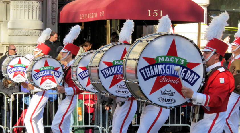 Drummers march in festive costumes during the 2012 Macy’s Thanksgiving Day Parade.