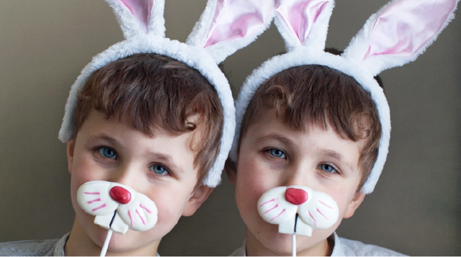 Two boys model their homemade bunny masks. Bunnies need a variety of nutrients and textures in their meals just like us so they can maintain their oral and overall health