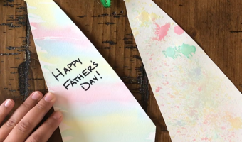 This Father’s Day craft tutorial uses common household items like baking soda, paper, food coloring, and old toothbrushes to make a special card for Dad.